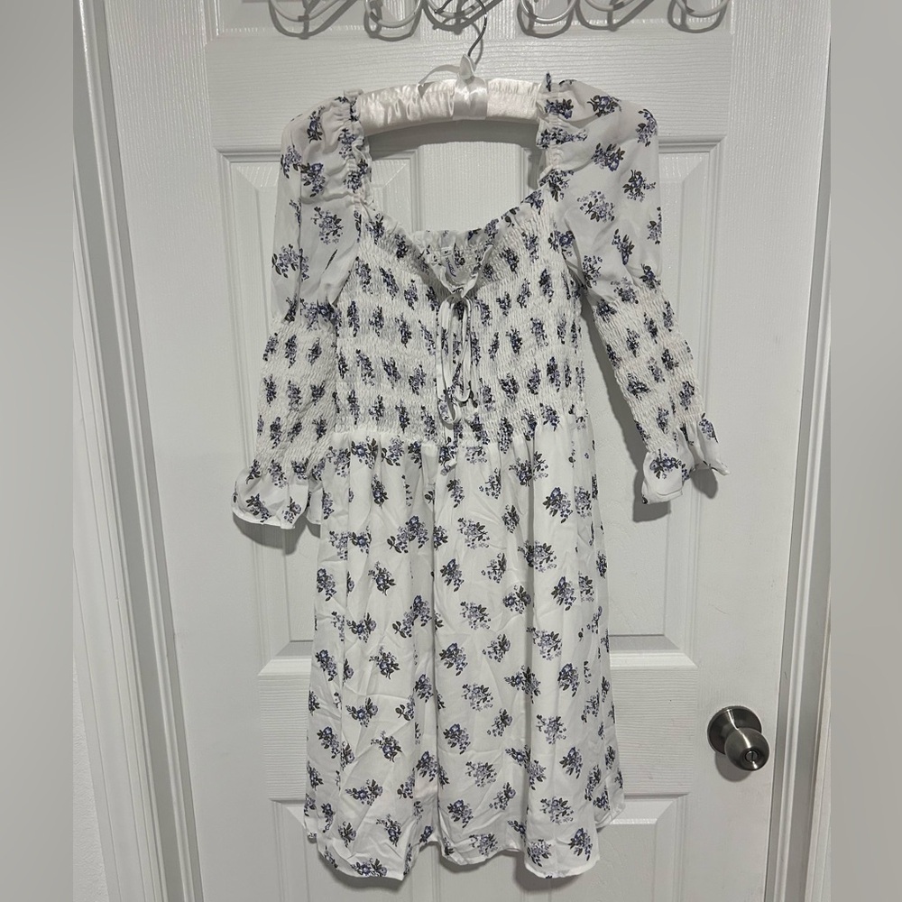 Off the Shoulder Elegant White Dress with Purple Floral Design Smocking

Size M